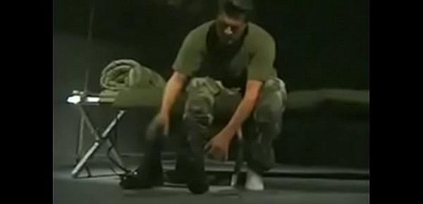  MILITARY FRIEND PLAYING WITH HIS FOOT AND BOOTS